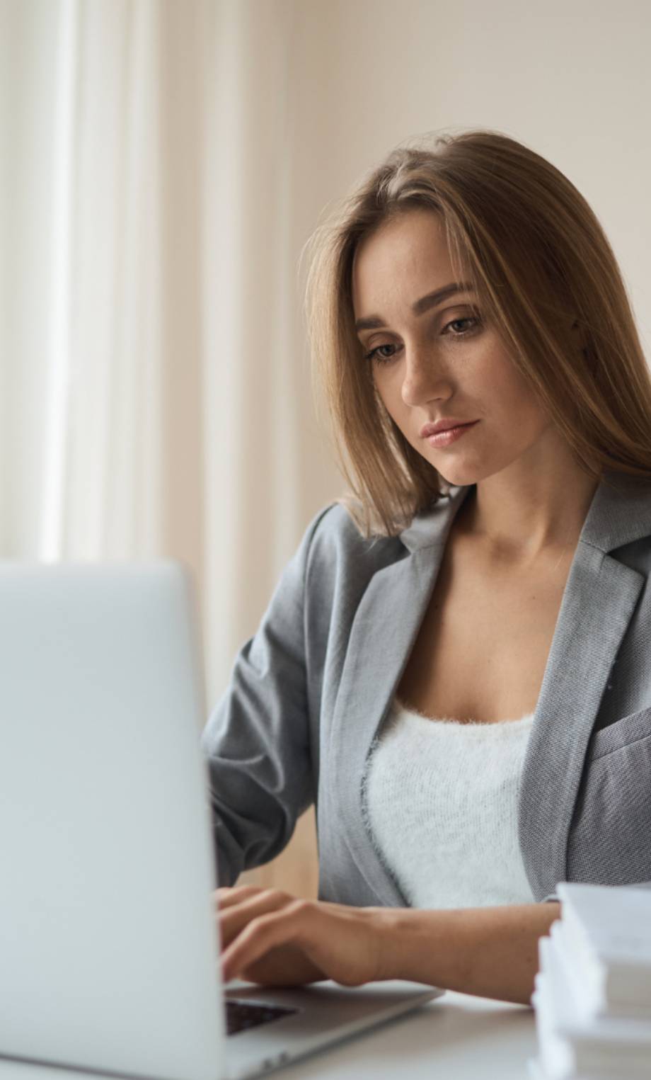 Woman at work on the laptop